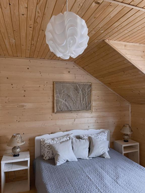 Postel nebo postele na pokoji v ubytování Чорногірський Вітер