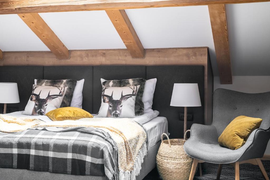 Ένα ή περισσότερα κρεβάτια σε δωμάτιο στο Villa Górska Ski & Bike