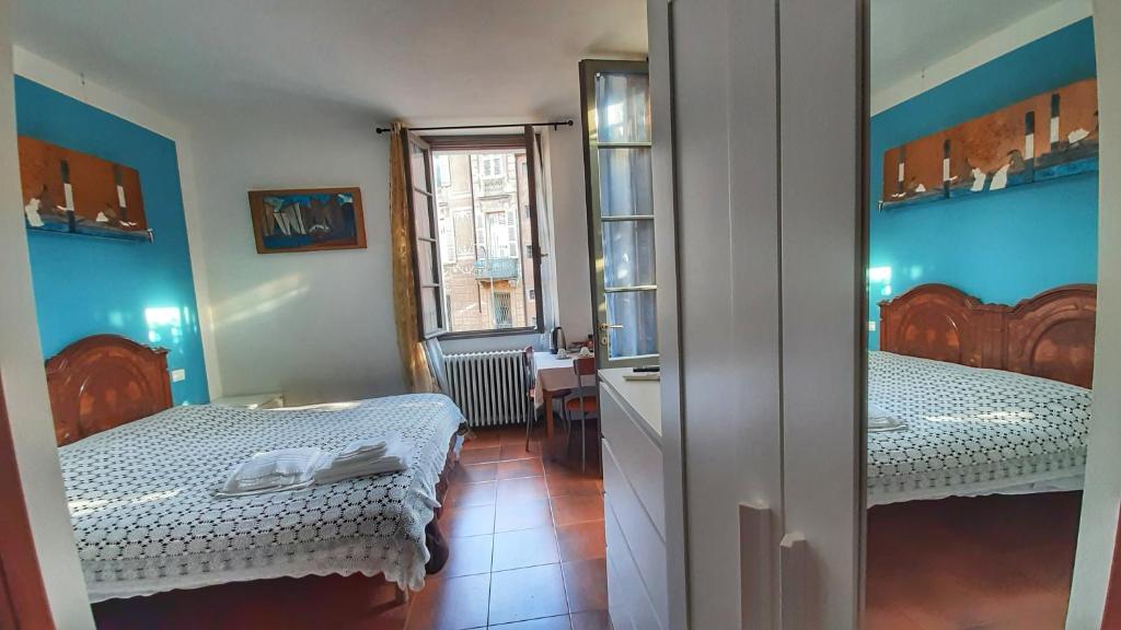 Postel nebo postele na pokoji v ubytování B&B La Veranda - Iseo