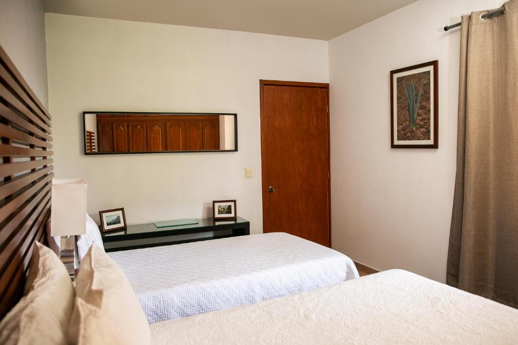 Postel nebo postele na pokoji v ubytování Comoda Casa Privada