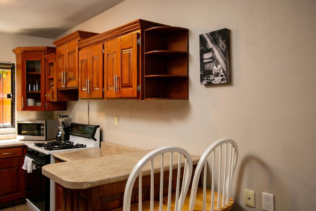 Kuchyň nebo kuchyňský kout v ubytování Comoda Casa Privada