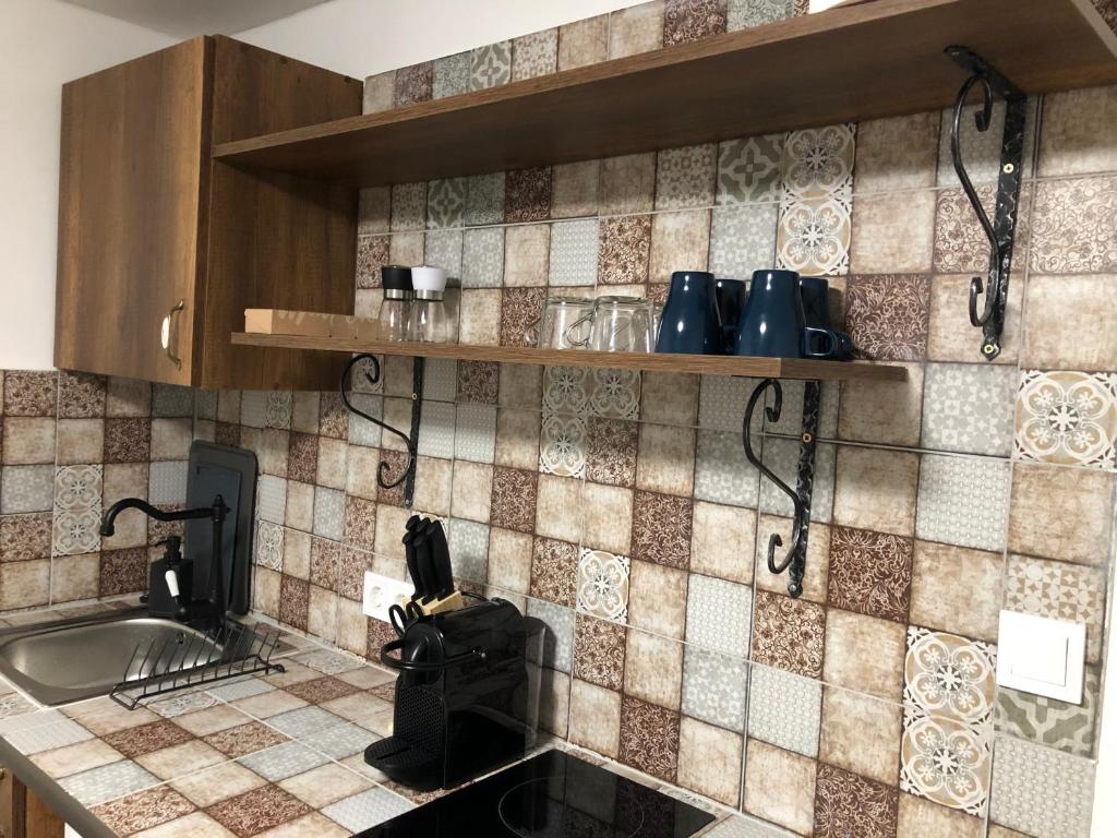 Kuchnia lub aneks kuchenny w obiekcie Mormota Vendégház