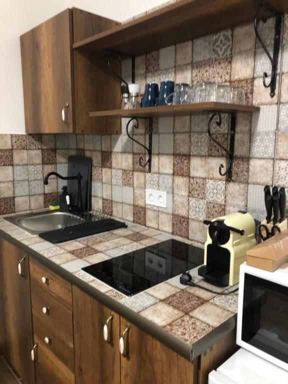 Kuchnia lub aneks kuchenny w obiekcie Mormota Vendégház