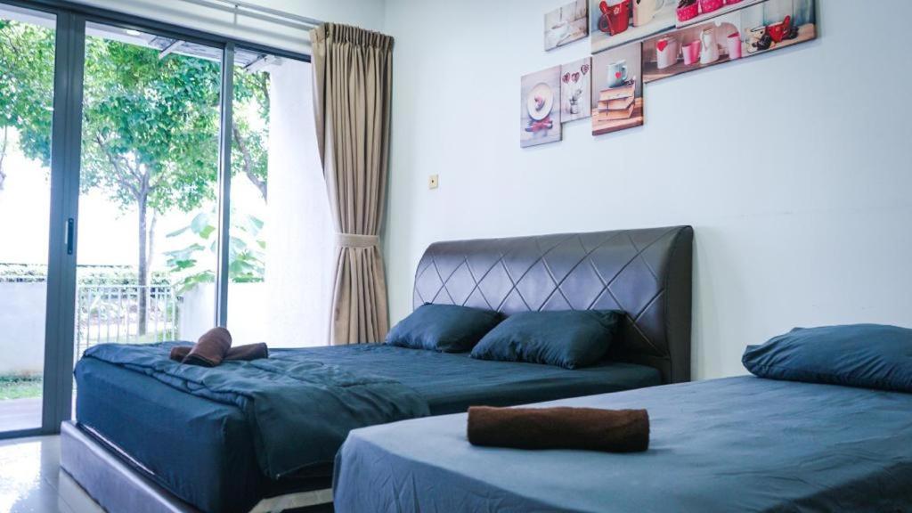 Katil atau katil-katil dalam bilik di Imago LOFT B corner garden studio BUDGET LOW PRICE EVERYDAY