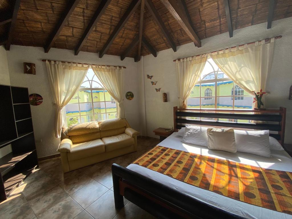 Postel nebo postele na pokoji v ubytování Hotel Puerto Gaviota