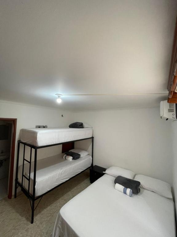 Postel nebo postele na pokoji v ubytování Casa Blanca Increíble Casa Completa Valledupar