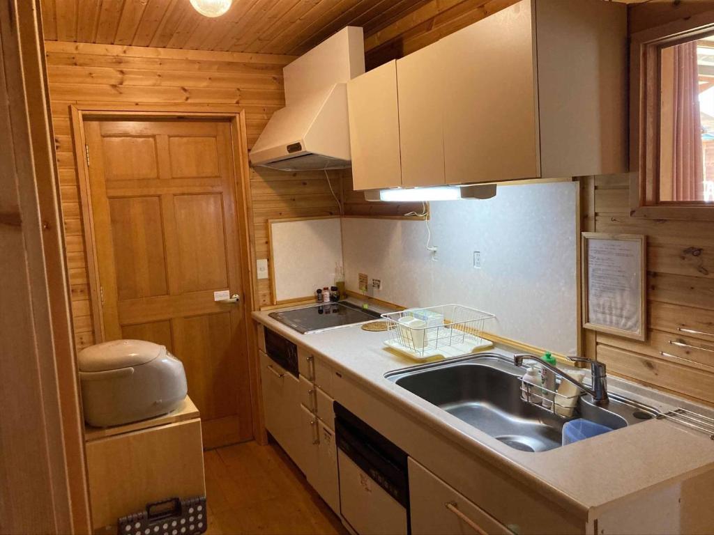 Kuchyň nebo kuchyňský kout v ubytování Madarao Vacances Village