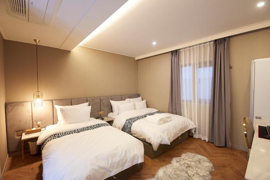 Denbasta Hotel - Deluxe Twin Room