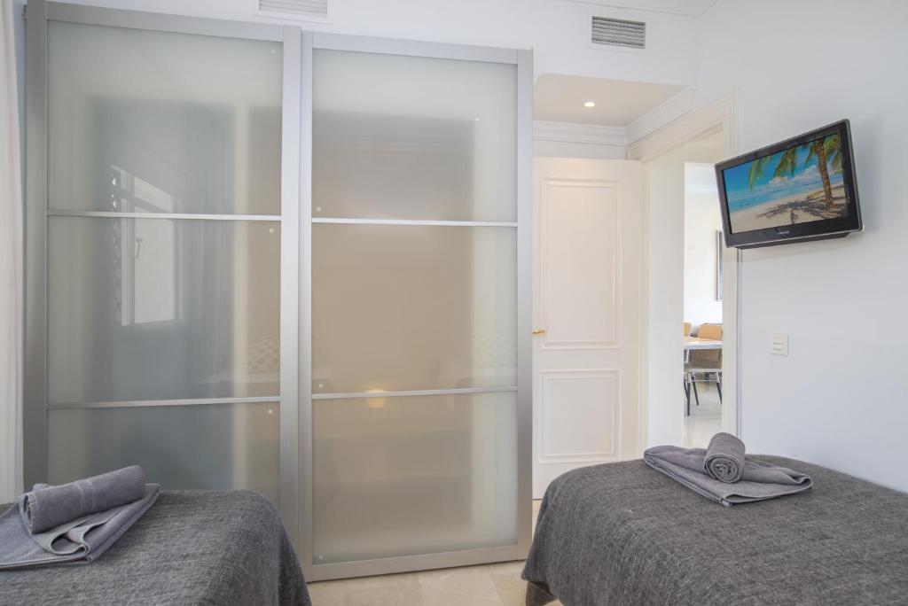 Łóżko lub łóżka w pokoju w obiekcie 2 bedroom apartment next to porto