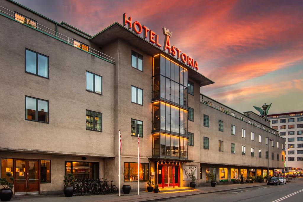 a hotel with a sign on the side of a building at Hotel Astoria, Best Western Signature Collection in Copenhagen