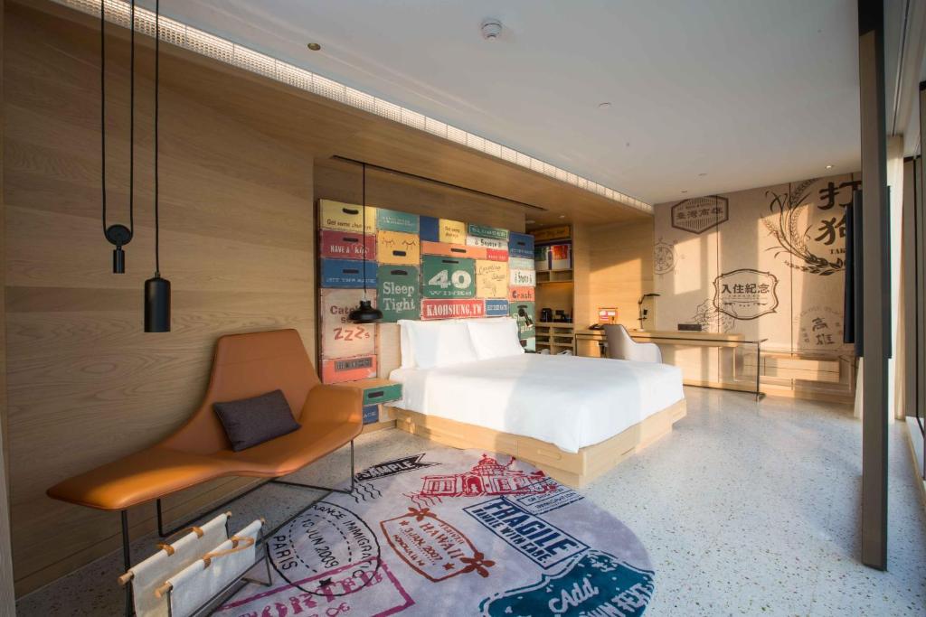 Postel nebo postele na pokoji v ubytování Hotel Indigo Kaohsiung Central Park by IHG