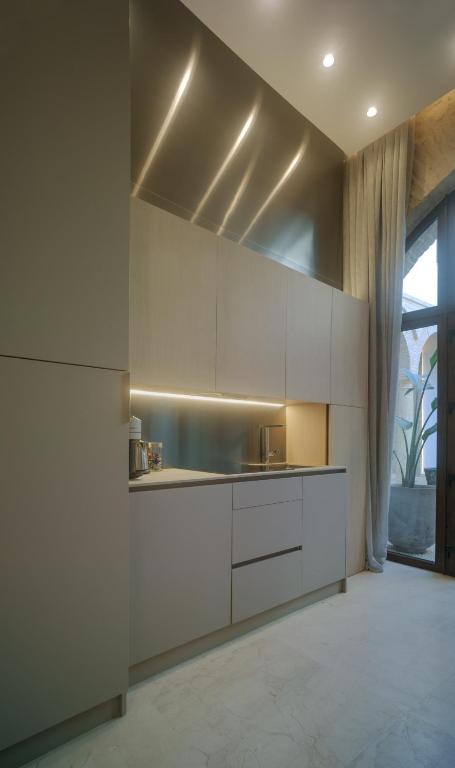 Kuchyňa alebo kuchynka v ubytovaní Apartamentos Los Patios del Pañuelo