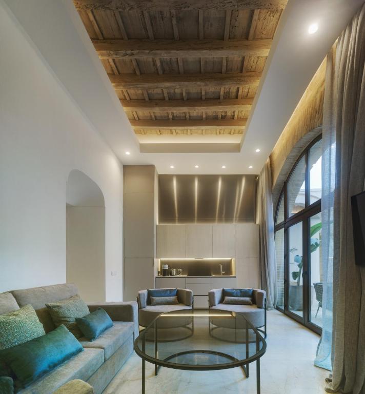 Posedenie v ubytovaní Apartamentos Los Patios del Pañuelo