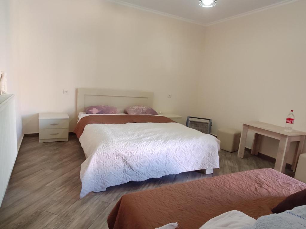 Postel nebo postele na pokoji v ubytování Guest House Gelit
