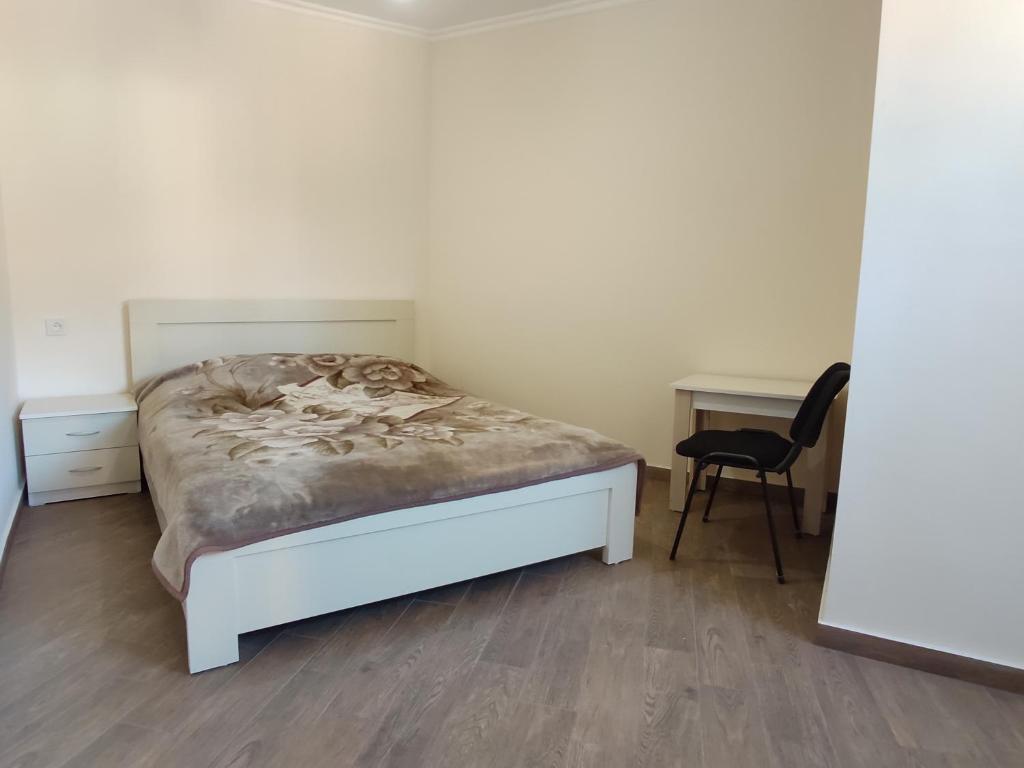 Postel nebo postele na pokoji v ubytování Guest House Gelit