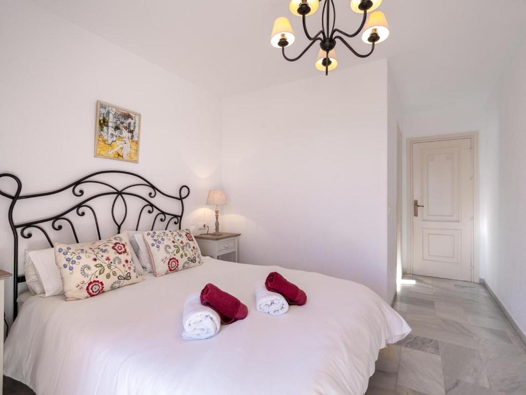 Posteľ alebo postele v izbe v ubytovaní 2 Mijas Playa Club in La Cala de Mijas