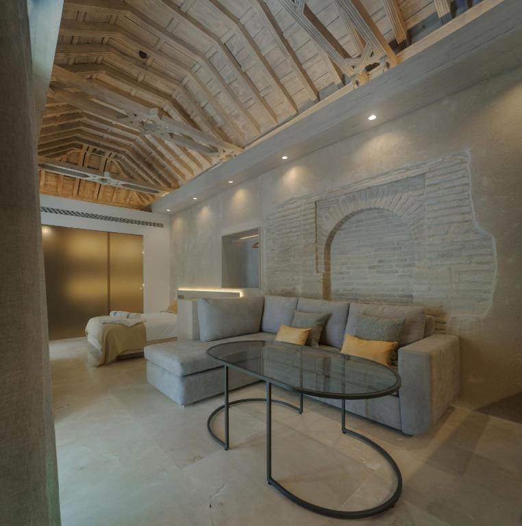 Posedenie v ubytovaní Apartamentos Los Patios del Pañuelo