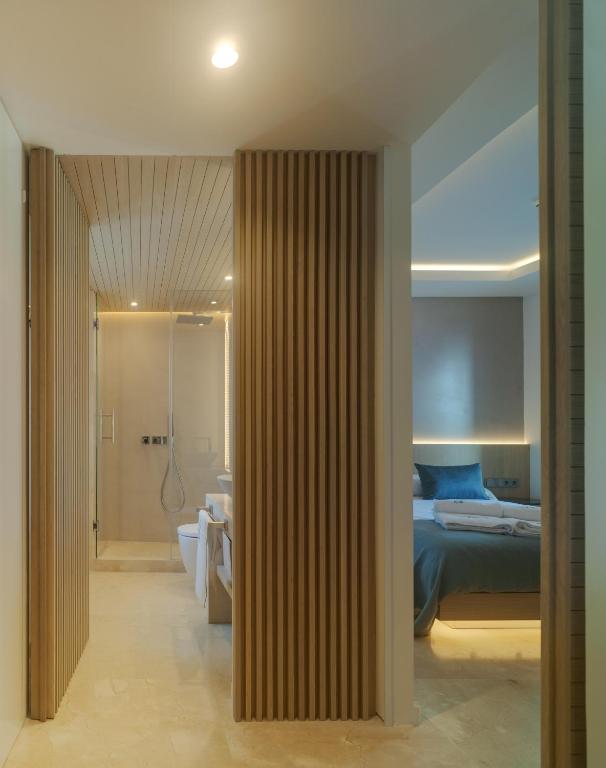 Posteľ alebo postele v izbe v ubytovaní Apartamentos Los Patios del Pañuelo