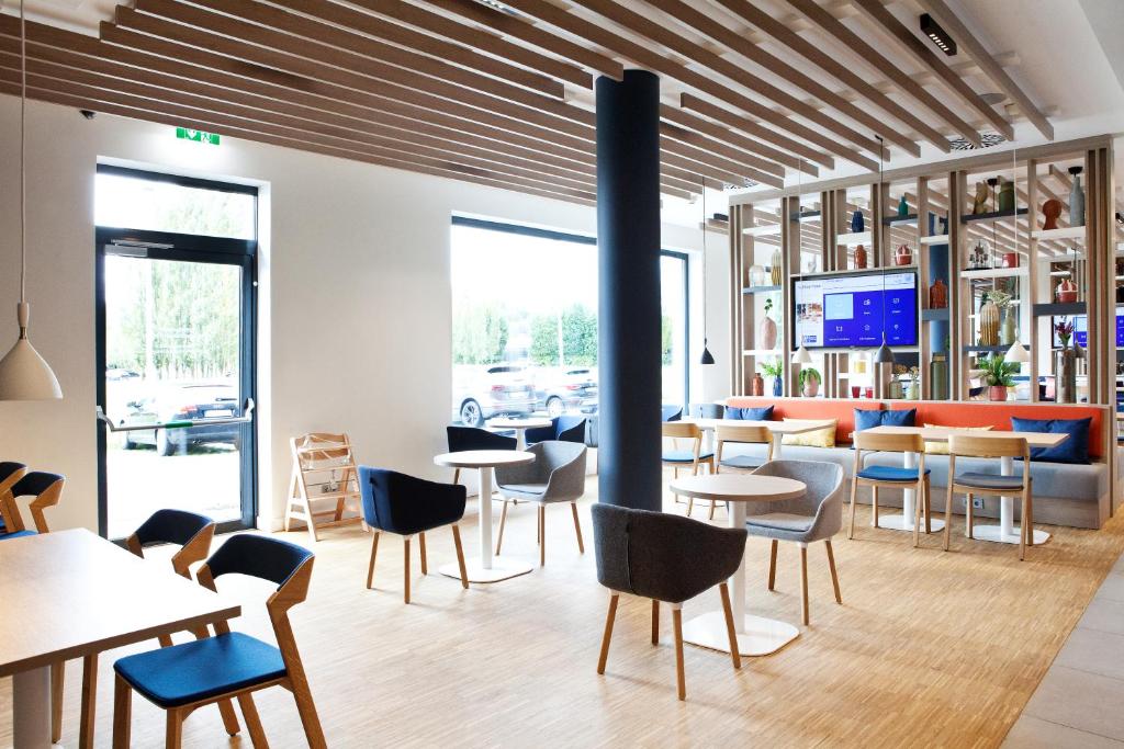 TV a/nebo společenská místnost v ubytování Holiday Inn Express - Lustenau