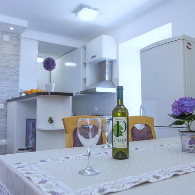 Kuchyňa alebo kuchynka v ubytovaní Apartment Mojaš