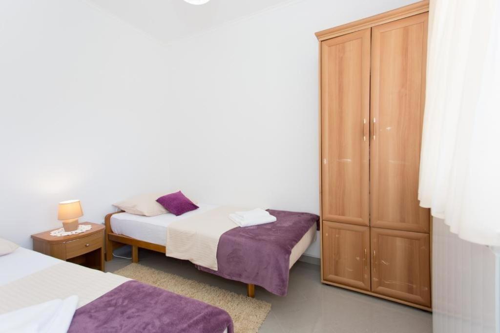 Posteľ alebo postele v izbe v ubytovaní Apartment Mojaš