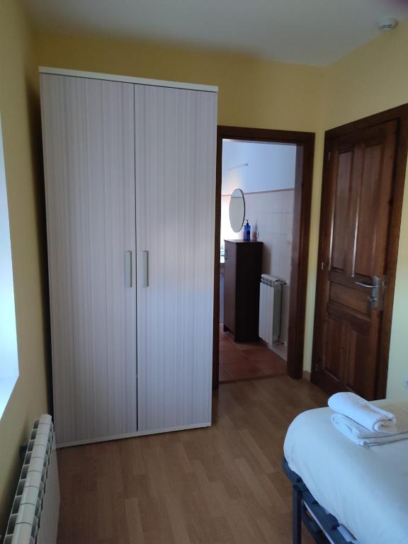 Postel nebo postele na pokoji v ubytování Albergue rural l'Almada de Yebra