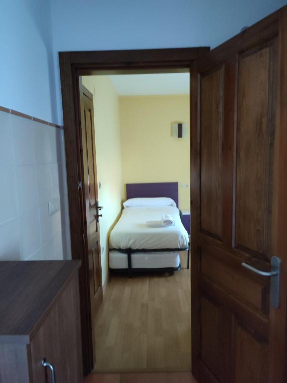 Postel nebo postele na pokoji v ubytování Albergue rural l'Almada de Yebra