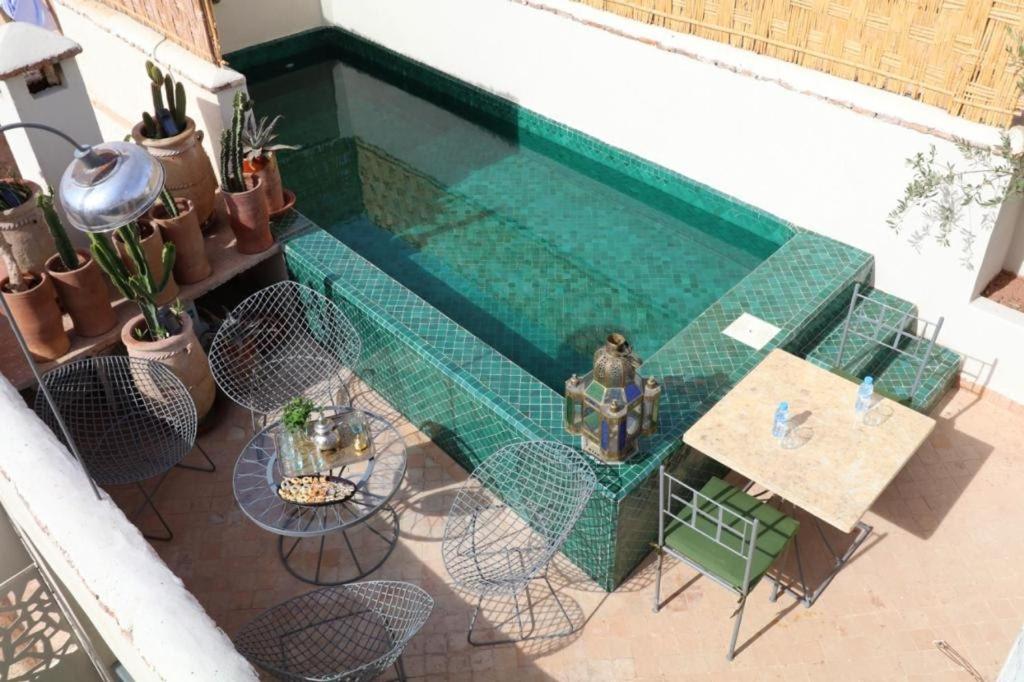Vaizdas į baseiną apgyvendinimo įstaigoje 103Riad Pool RoofTop & Hammam arba netoliese