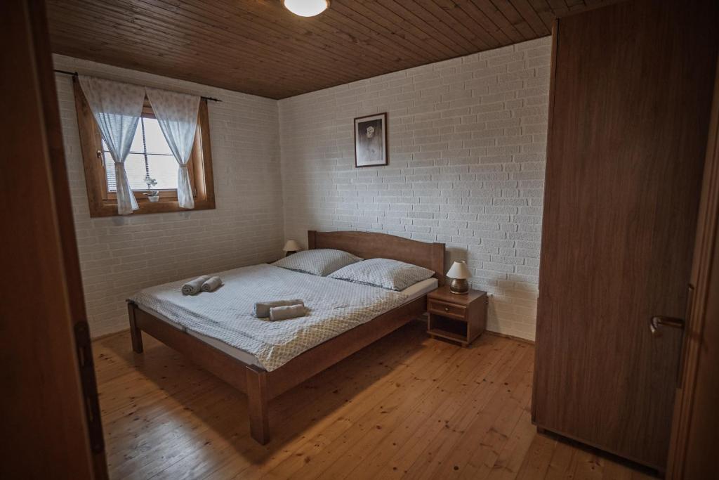 Postel nebo postele na pokoji v ubytování Chata Vŕšky Terchová