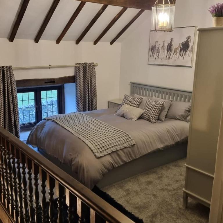 Postel nebo postele na pokoji v ubytování Denver Cottage