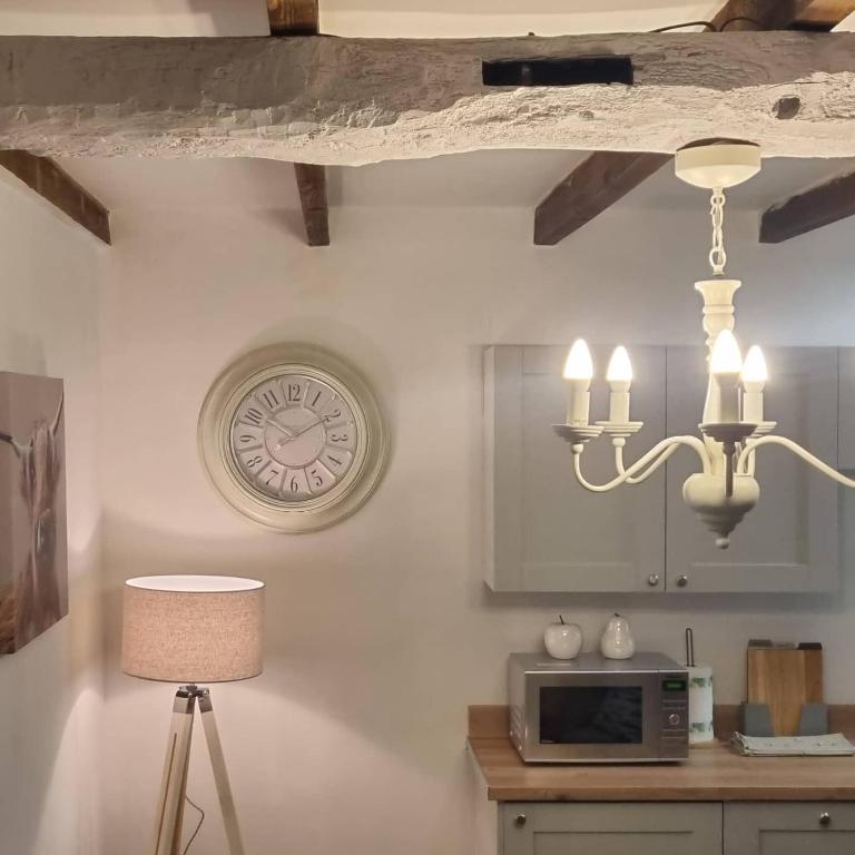 Kuchyň nebo kuchyňský kout v ubytování Denver Cottage