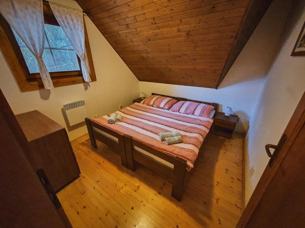 Postel nebo postele na pokoji v ubytování Chata Vŕšky Terchová