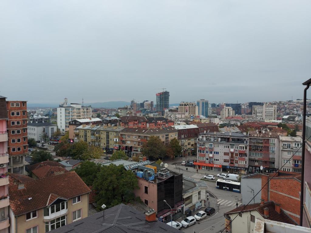 an aerial view of a city with buildings at City View - Downtown Apartment in Prishtina in Pristina