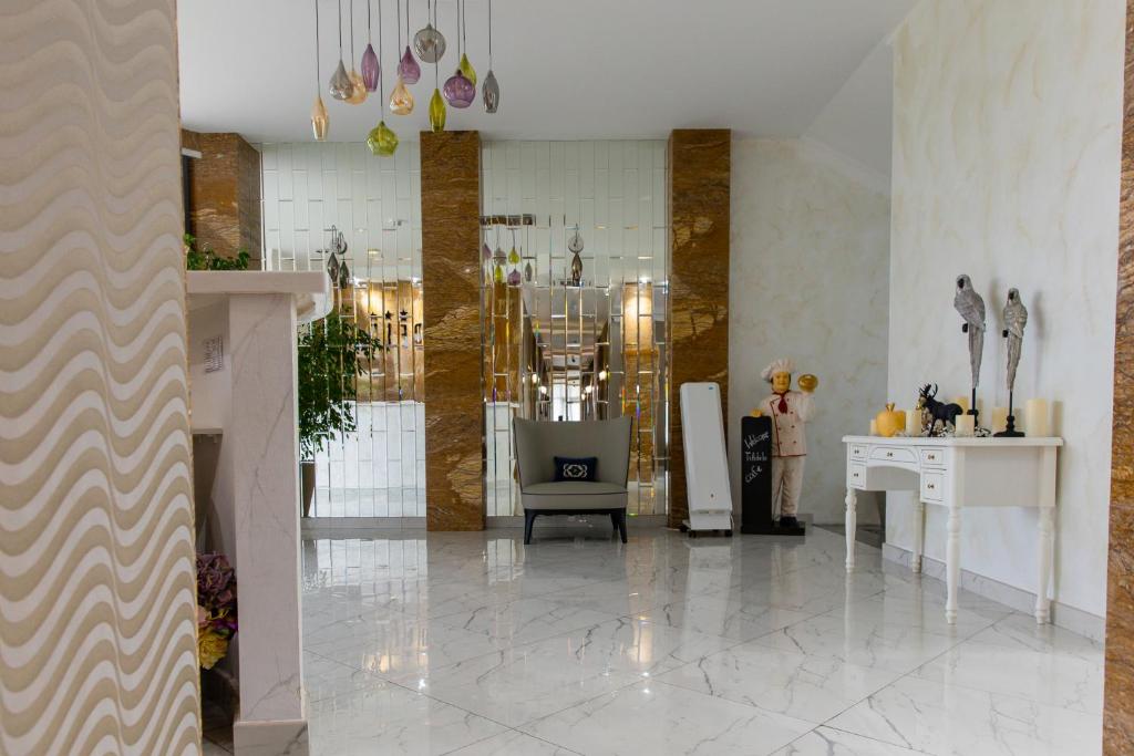 Posezení v ubytování TiAdele Hotel