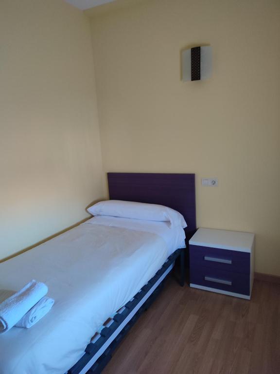 Postel nebo postele na pokoji v ubytování Albergue rural l'Almada de Yebra