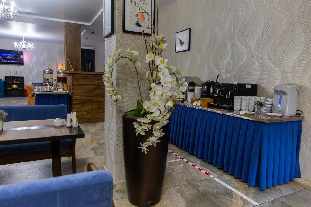 Příslušenství pro přípravu čaje a kávy v ubytování TiAdele Hotel