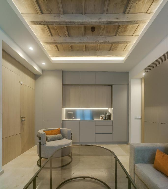 Posedenie v ubytovaní Apartamentos Los Patios del Pañuelo