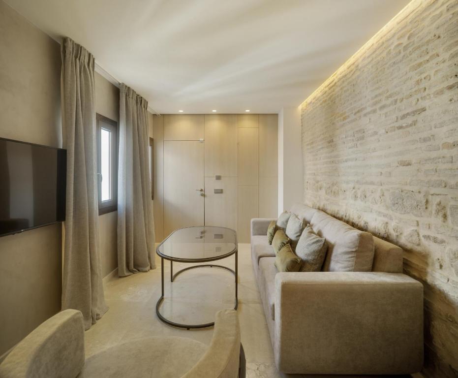 Posedenie v ubytovaní Apartamentos Los Patios del Pañuelo