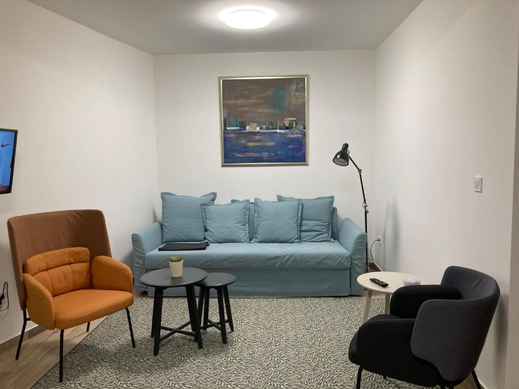 Posezení v ubytování ELIXÍR Apartman Pécsvárad