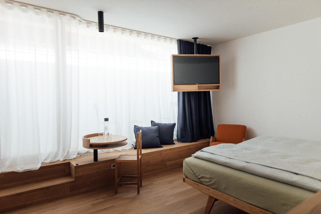 Postel nebo postele na pokoji v ubytování Haus am Turm