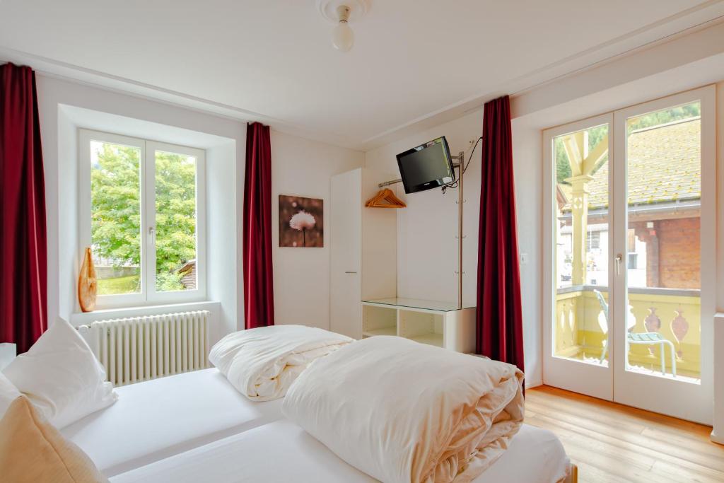 Postel nebo postele na pokoji v ubytování Hotel Vallatscha