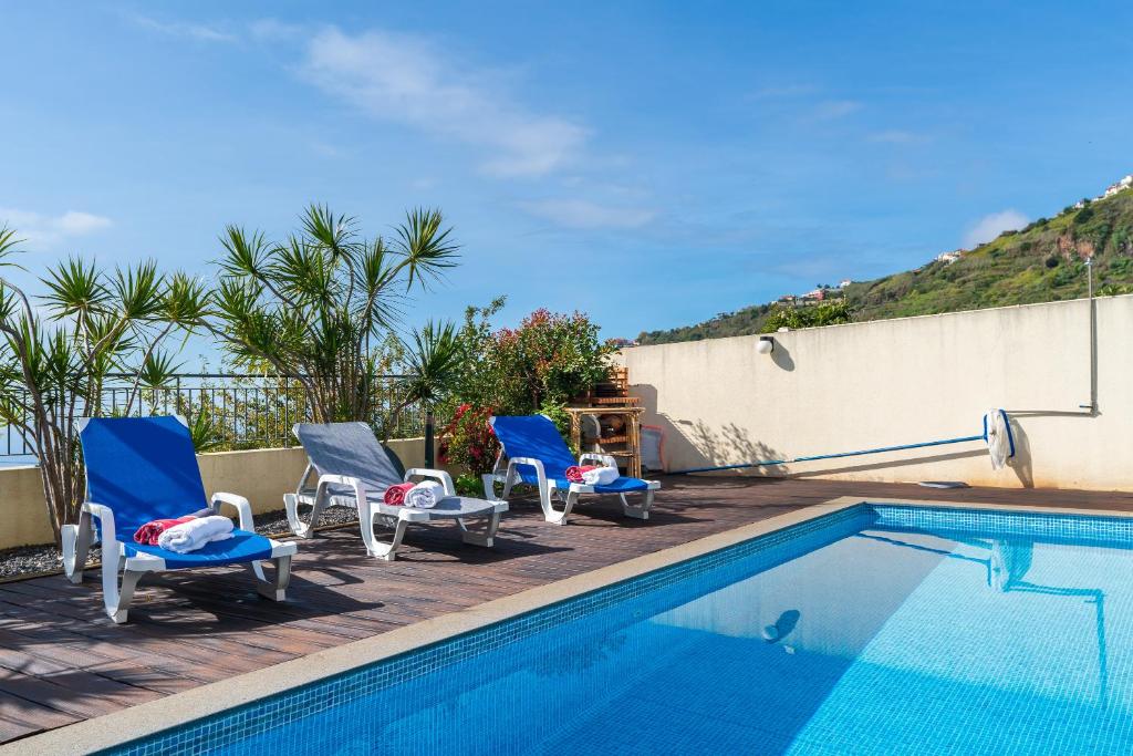 Casa Gabriel II Relax in Arco da Calheta tesisinde veya buraya yakın yüzme havuzu