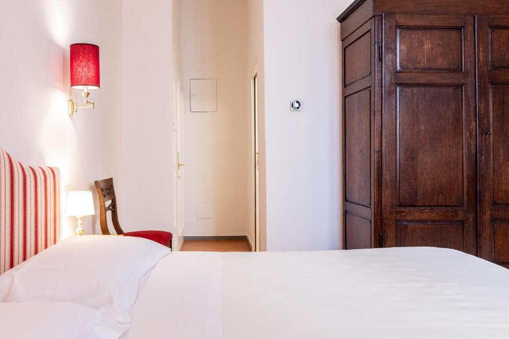 Posteľ alebo postele v izbe v ubytovaní La Casa del Ghiberti B&B