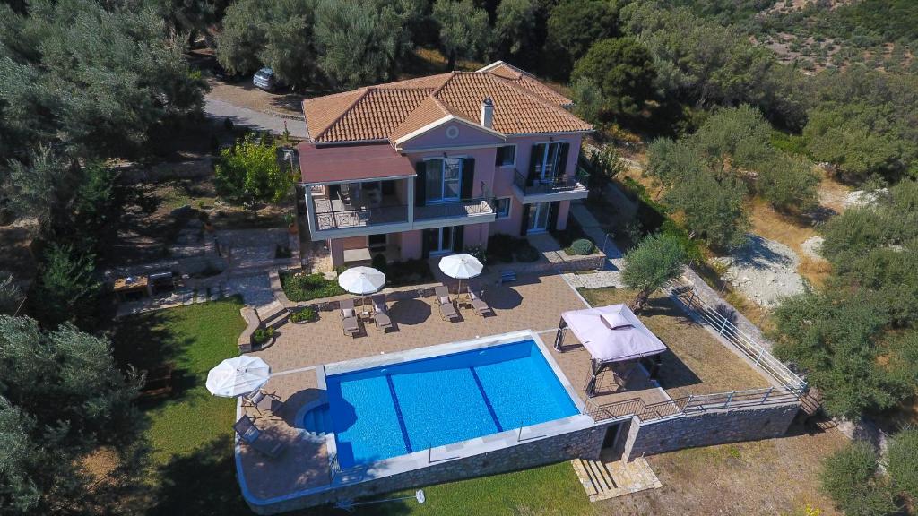 an aerial view of a house with a swimming pool at Villa Phaedra, Inoro Villas in Katouna