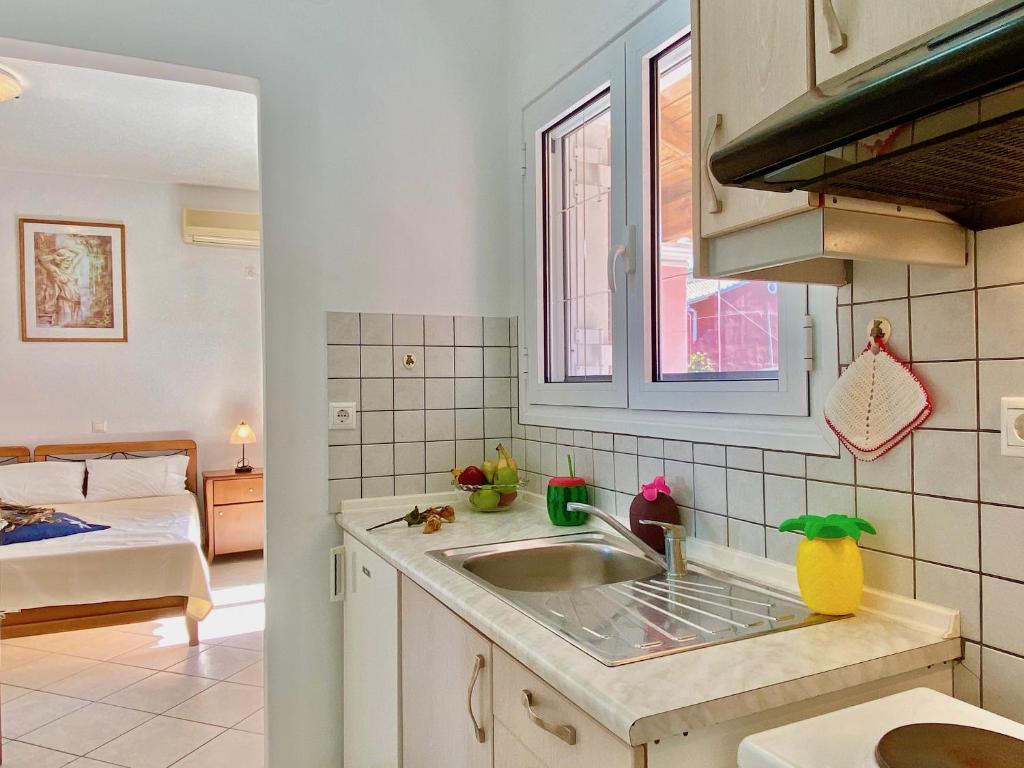 A kitchen or kitchenette at SeaFront Villa Ourania