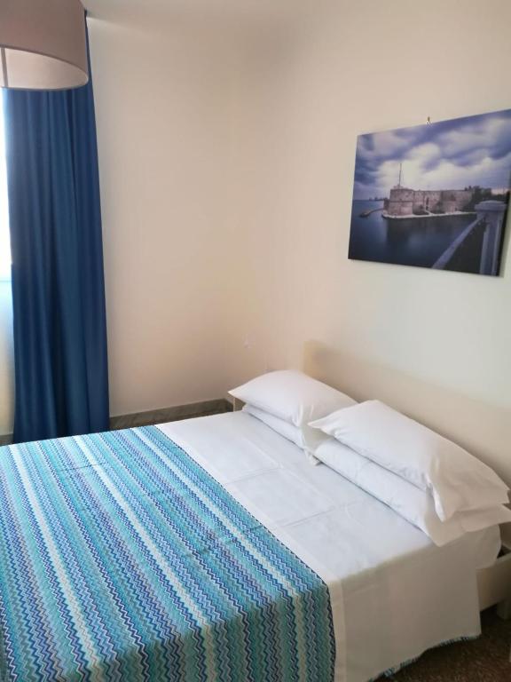 Postel nebo postele na pokoji v ubytování SETTIMO SOLE Affitta Camere