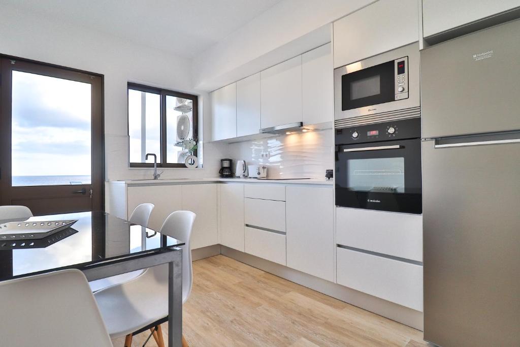 A cozinha ou kitchenette de Janela Mar VIP
