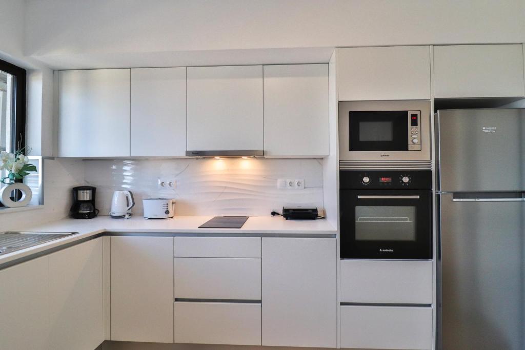 A cozinha ou kitchenette de Janela Mar VIP