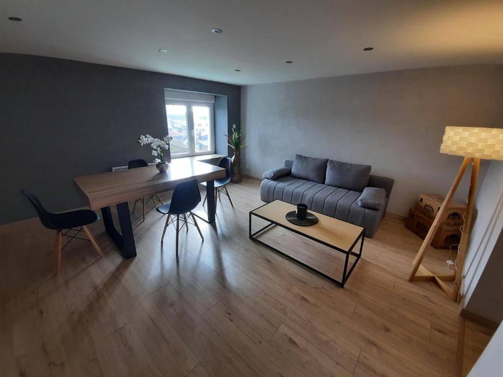 Posezení v ubytování Gîte chez Thomas et John