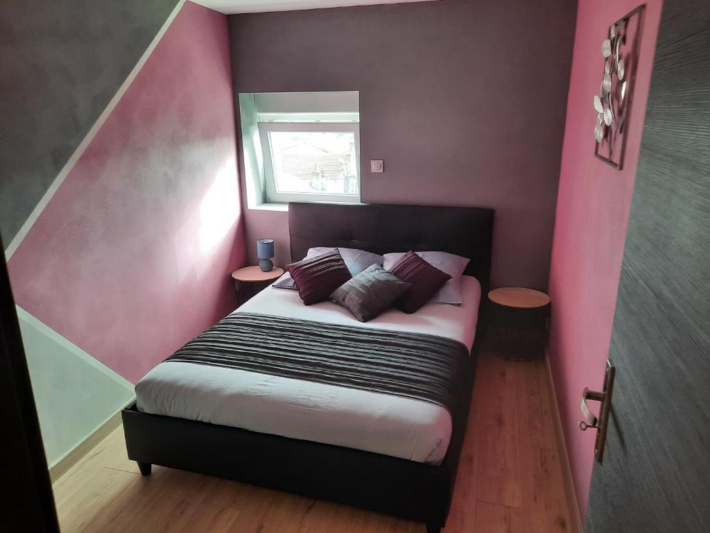 Postel nebo postele na pokoji v ubytování Gîte chez Thomas et John